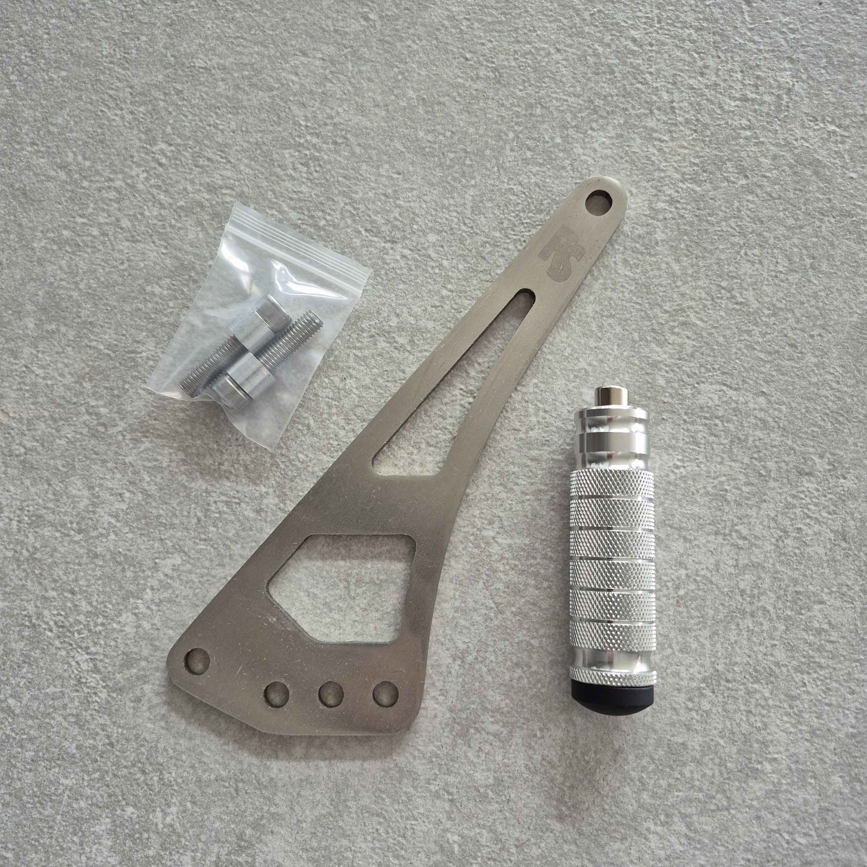 Shiftlock / Footlock – Ochrona i Kontrola Wheelie 1 sztuka (1 strona)